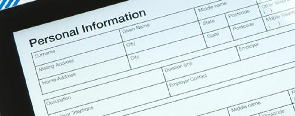 Closeup photo of information forms on a tablet.